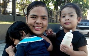 a Mormon mother in the Philippines with her two kids