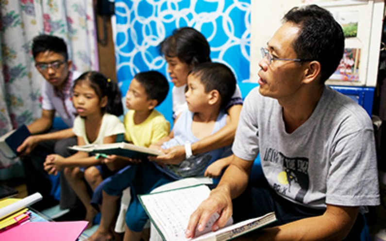 filipino family going to church