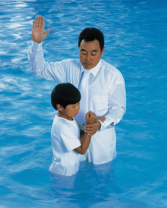 A chid on the waters of baptism