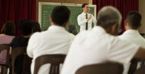 Man teaching a group of people