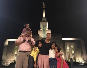 family standing outside Mormon temple